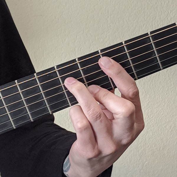 Playing a Minor Dominant Seventh Barre Chord on Guitar